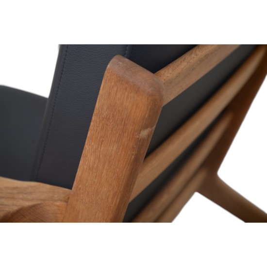 Hans Wegner GE290 chair in oak and black leather 1980s