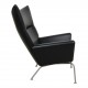 Hans Wegner Wingchair reupholstered i black classic leather