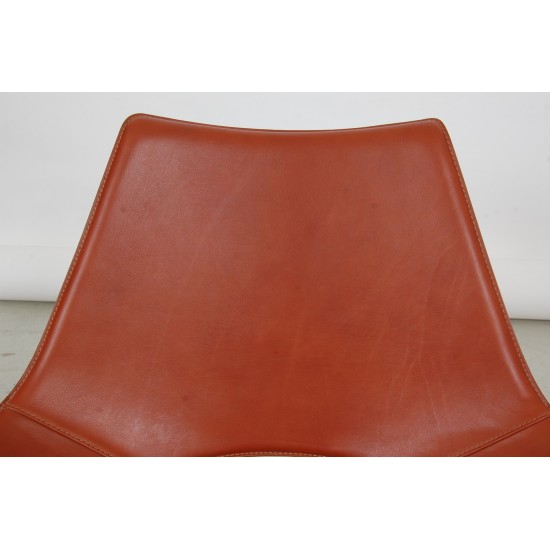 Fabricius and Kastholm Scimitar lounge chair in cognac leather