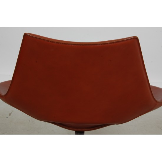 Fabricius and Kastholm Scimitar lounge chair in cognac leather