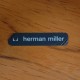 Charles Eames Lounge chair ottoman i brun læder