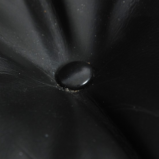 Charles Eames Lounge chair i sort læder 1990'erne