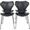 Arne Jacobsen sæt af fire Syver stole i sort classic læder