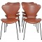 Set of 6 Arne Jacobsen seven chairs in brandy leather and black legs