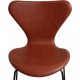 Set of 6 Arne Jacobsen seven chairs in brandy leather and black legs