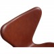 Set of 6 Arne Jacobsen seven chairs in brandy leather and black legs