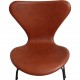 Set of 6 Arne Jacobsen seven chairs in brandy leather and black legs