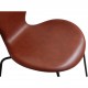 Set of 6 Arne Jacobsen seven chairs in brandy leather and black legs