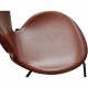 Set of 6 Arne Jacobsen seven chairs in brandy leather and black legs