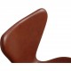 Set of 6 Arne Jacobsen seven chairs in brandy leather and black legs
