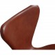 Set of 6 Arne Jacobsen seven chairs in brandy leather and black legs