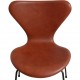 Set of 6 Arne Jacobsen seven chairs in brandy leather and black legs