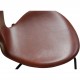 Set of 6 Arne Jacobsen seven chairs in brandy leather and black legs