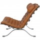 Arne Norell Ari chair with stool in cognac leather