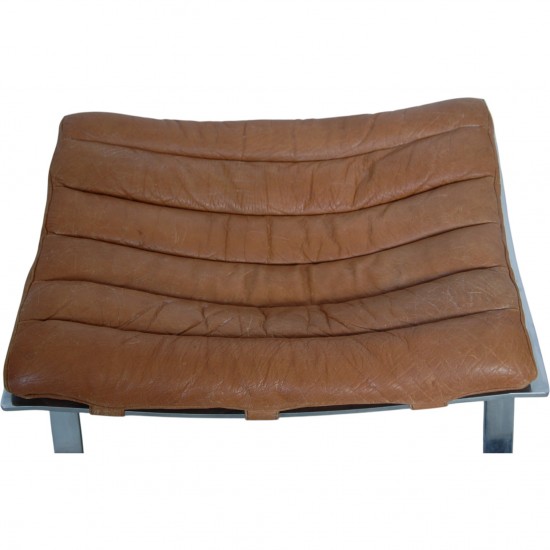 Arne Norell Ari chair with stool in cognac leather