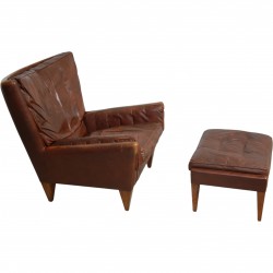 Illum Wikkelsøe V11 lounge chair with stool in brown leather