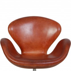 Arne Jacobsen Swan chair in patinated cognac leather
