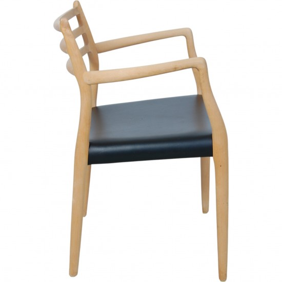 NO Møller NO62 armchair in beech and black leather