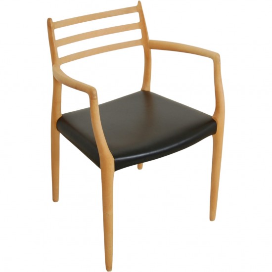 NO Møller NO62 armchair in beech and black leather