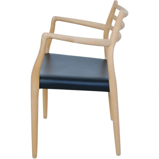 NO Møller NO62 armchair in beech and black leather