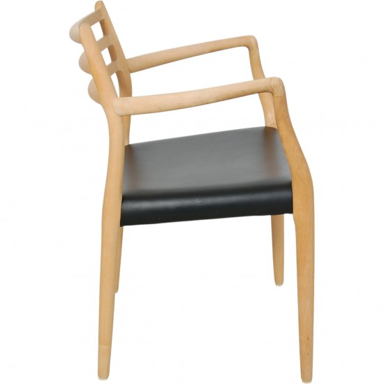 NO Møller NO62 armchair in beech and black leather