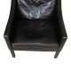 Børge Mogensen Wingchair in black leather with patina, and black legs