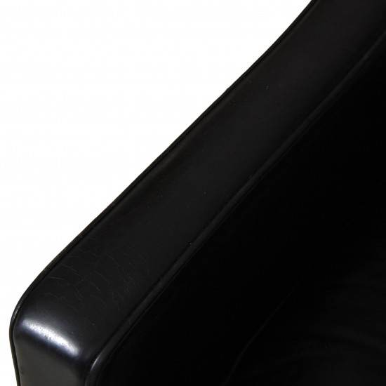 Børge Mogensen Wingchair in black leather with patina, and black legs