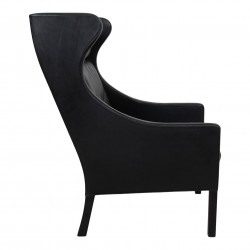 Børge Mogensen Wingchair in black leather with patina, and black legs