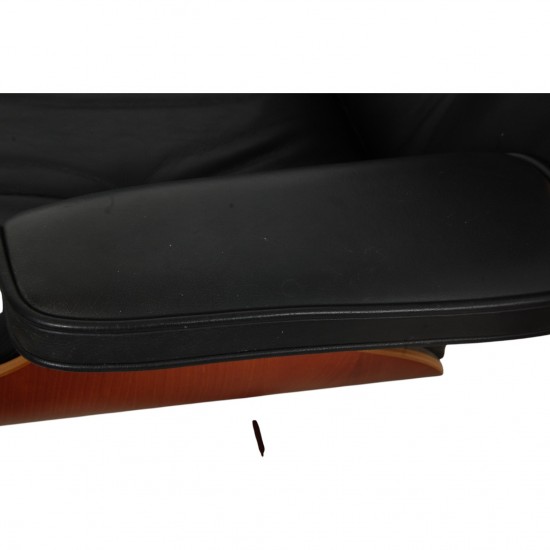 Charles Eames Lounge chair with ottoman in black leather