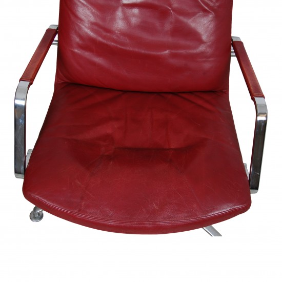 Jørgen Kastholm lounge chair in red leather with patina