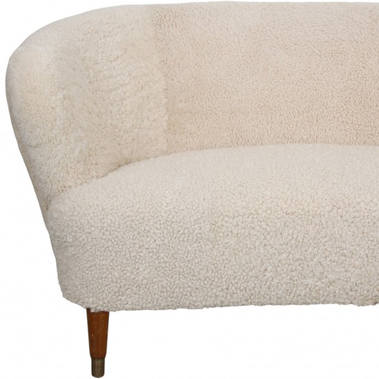 Danish 2.Seater sofa reupholstered in Sheepskin