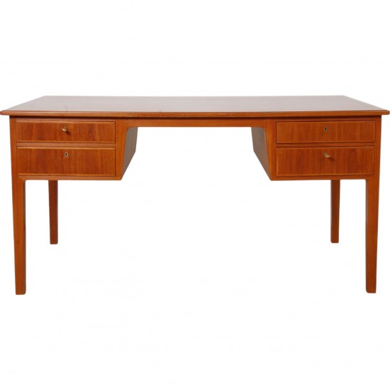 Desk of teak with 4 drawers