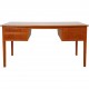 Desk of teak with 4 drawers