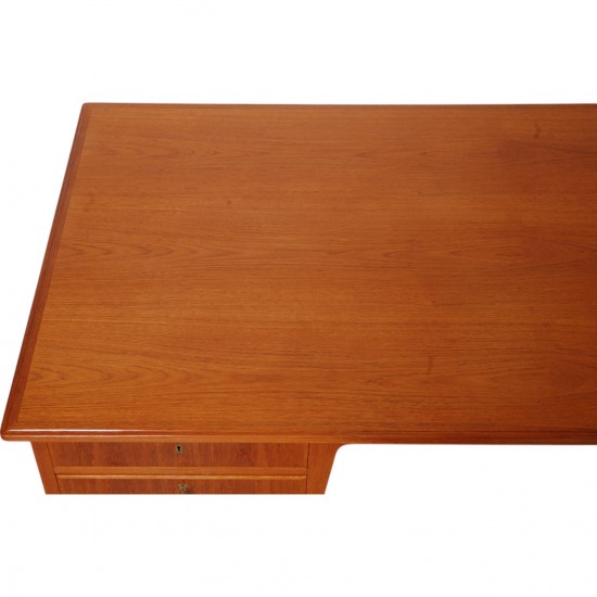 Desk of teak with 4 drawers
