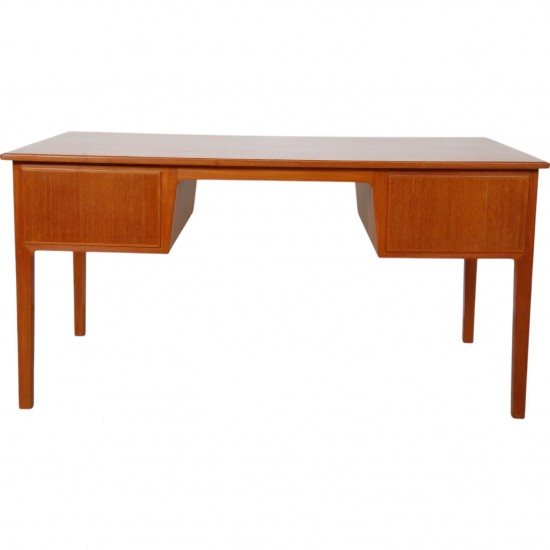 Desk of teak with 4 drawers