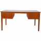 Desk of teak with 4 drawers