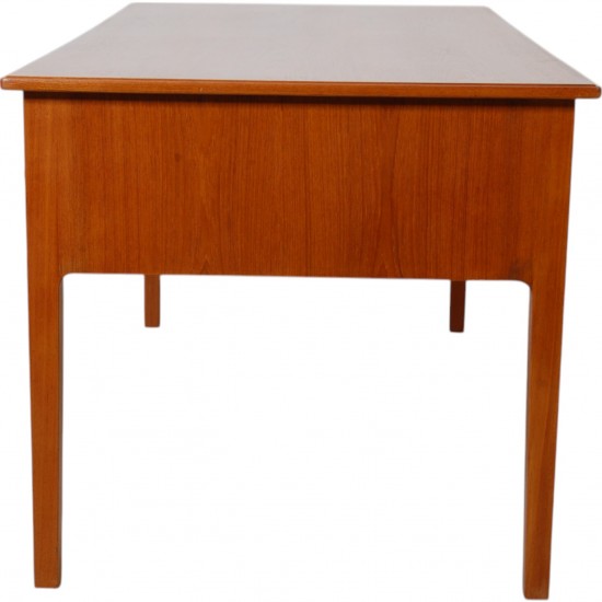 Desk of teak with 4 drawers
