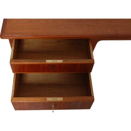 Desk of teak with 4 drawers