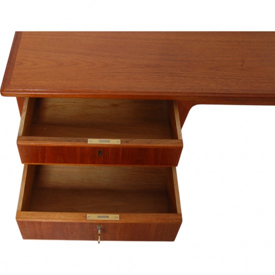 Desk of teak with 4 drawers