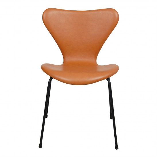 Arne Jacobsen Seven chair reupholstered in leather, and with black legs