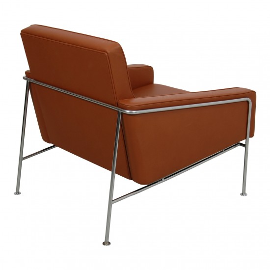 Arne Jacobsen Airport chair with walnut aniline leather
