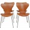 Sæt af fire Arne Jacobsen Syver stole i patineret cognac læder
