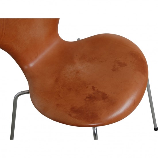 Set of four Arne Jacobsen Seven chairs in patinated cognac leather