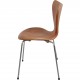 Set of four Arne Jacobsen Seven chairs in patinated cognac leather