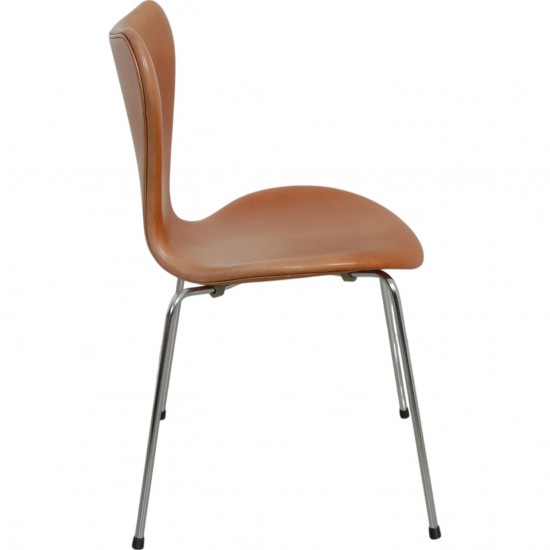 Set of four Arne Jacobsen Seven chairs in patinated cognac leather