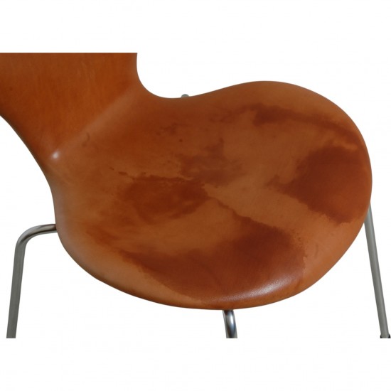 Set of four Arne Jacobsen Seven chairs in patinated cognac leather