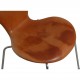 Set of four Arne Jacobsen Seven chairs in patinated cognac leather