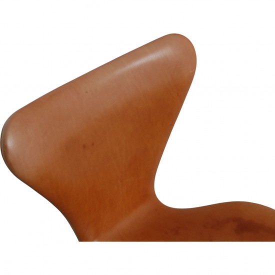 Set of four Arne Jacobsen Seven chairs in patinated cognac leather