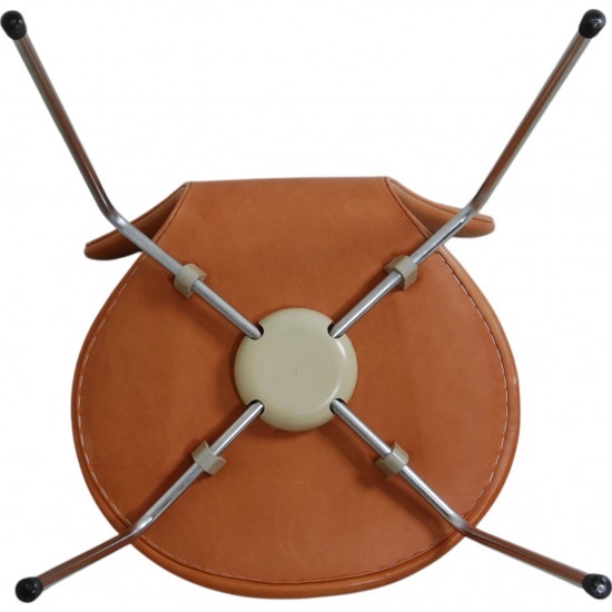 Set of four Arne Jacobsen Seven chairs in patinated cognac leather