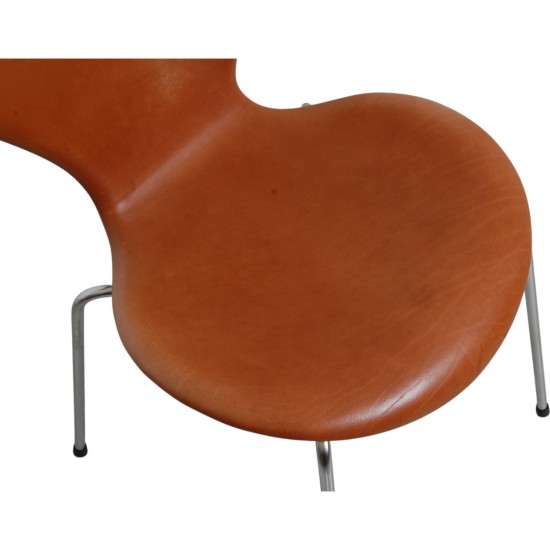 Set of four Arne Jacobsen Seven chairs in patinated cognac leather